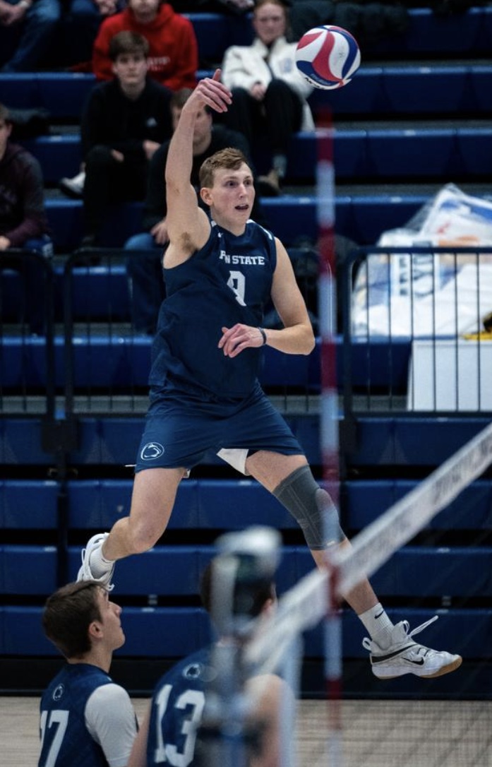 Penn State's John Kerr attacks against Lewis in their NCAA men's volleyball match in State College, Pennsylvania on January 6, 2024